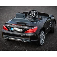 Детский электромобиль Mercedes Benz SL63 AMG черный, мягкое сиденье фото 14