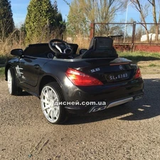 Детский электромобиль Mercedes Benz SL63 AMG черный, мягкое сиденье фото 41